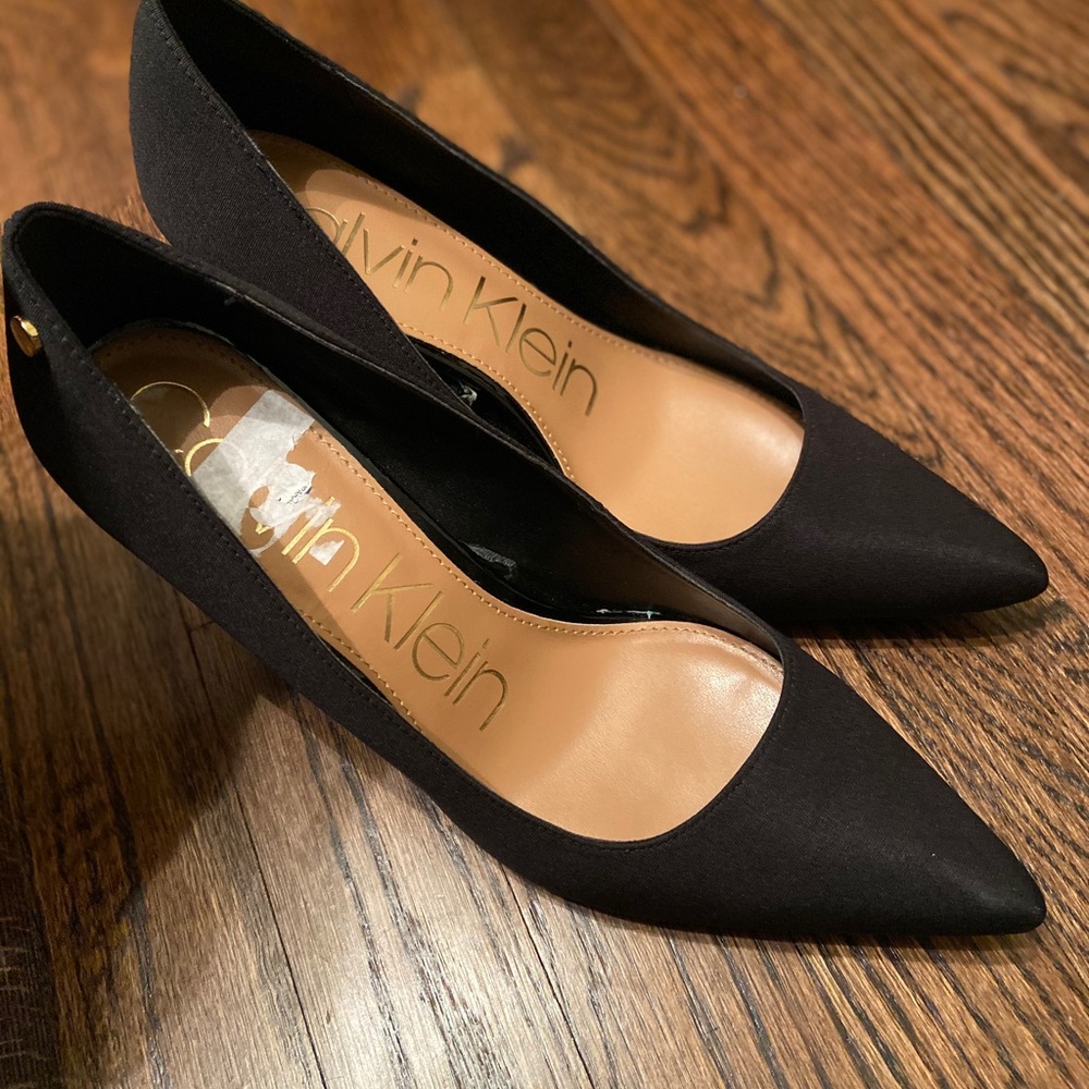 Black Calvin Klein pumps